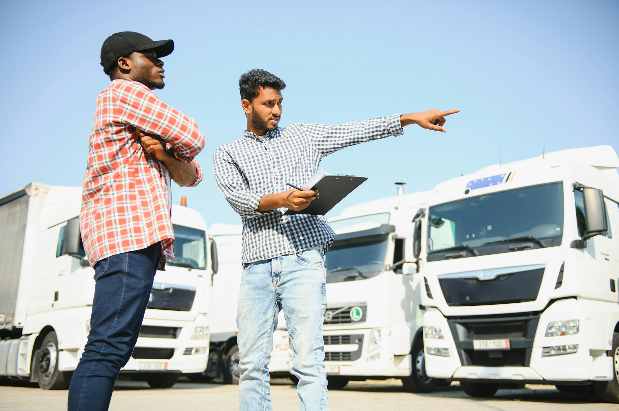 Logistics manager controlling truck driver schedule